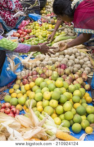 Documentary Editorial Image. An Unidentified Indian At His Fruit And Vegetable Shop In A Small Rural