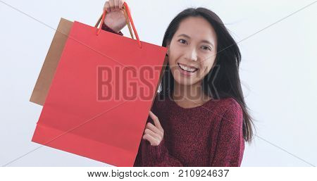 Happy Woman holding shopping bags 