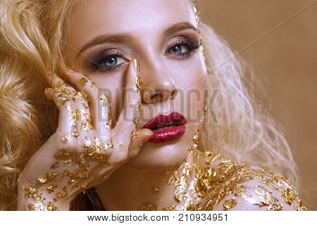 Beauty Woman ,  Blond  Hair , Professional Make-up , Gold Color.