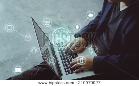Top angle and closeup view of businessman using the laptop making online shopping and banking payment. Blurred background .