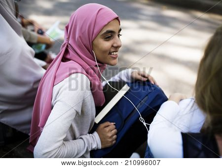 Diverse children studying outdoor