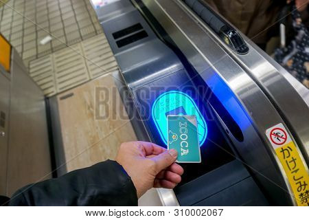 Osaka, Japan, January 14 2019 : Closeup Hand Of People Using Japan Ic Card 