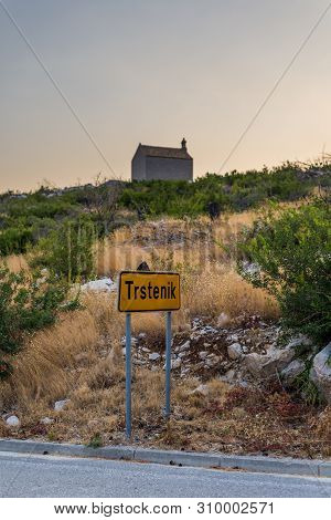 Road To Small Village Trstenik In Peljesac Peninsula, With Mountins And Blue Sky As Background
