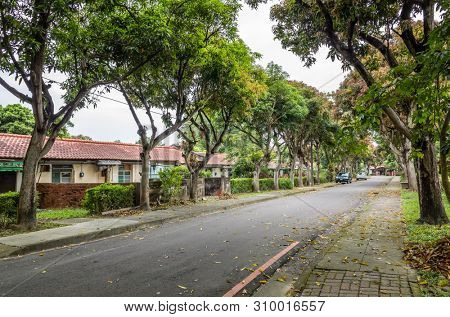 Nantou, Taiwan - June 25th, 2019: street scenery with old house and trees at Zhongxing New Village, Nantou, Taiwan