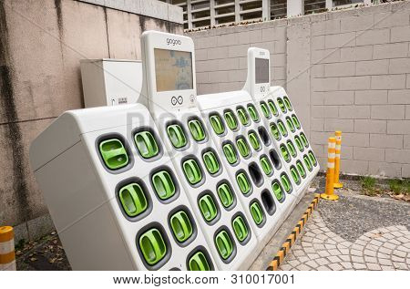 Taipei, Taiwan - June 7th, 2019: charging station for battery packs of Taiwan-based Gogoro electronic motocycle at street in Taipei, Taiwan, Asia