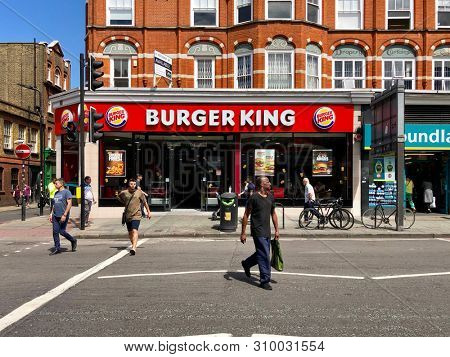 CAMDEN, LONDON - JULY 5, 2019: A Burger King fast food restaurant in a street in Camden, North London, UK.