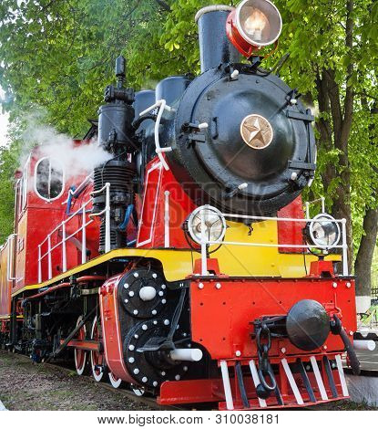 Old Soviet Steam Locomotive Blowing Off The Steam Out Of The Whistle
