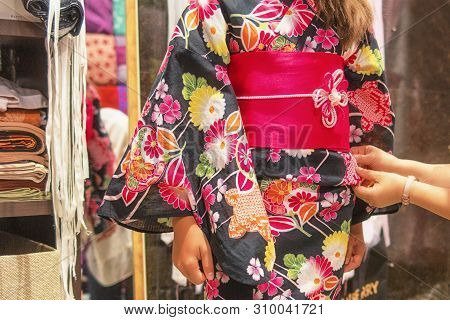 A Pretty Girl In A Kimono. Kimono Is The Traditional Dress Worn Popular In Japan.european Girl In Ki