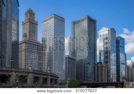 Chicago City Skyscrapers On The River Canal, Blue Sky Background