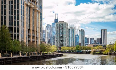 Chicago City Skyscrapers On The River Canal, Blue Sky Background