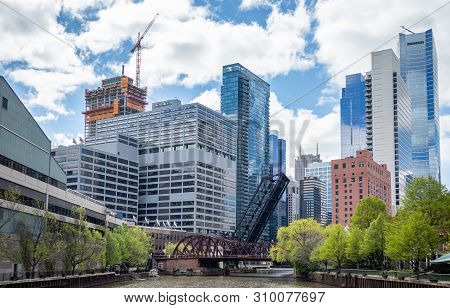 Chicago City Skyscrapers On The River Canal, Blue Sky Background