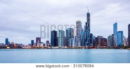 Panoramic View Of Chicago City High Rise Buildings Cloudy Sky In The Evening