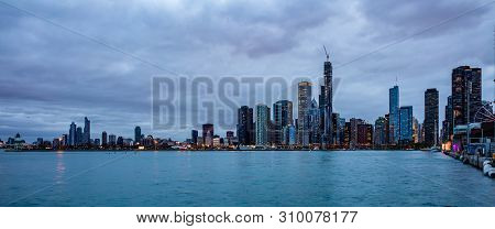 Panoramic View Of Chicago City High Rise Buildings Cloudy Sky In The Evening