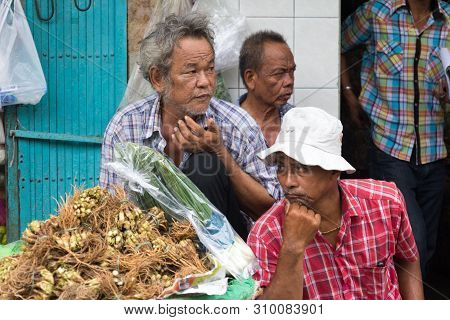 Bangkok, Thailand - July 9th 2015: Vegetable Vendors At Pak Khlong Talat Market Waiting For Business