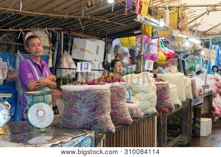 Bangkok, Thailand - July 9th 2015: Vendors At Pak Khlong Talat Flower Market. The Market Is Famous F