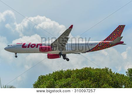 Airplane Landing At Singapore Airport