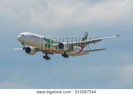 Airplane Landing At Singapore Airport