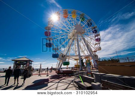 Barcelona, Spain - April, 2019: Ferris Wheel In Tibidabo With Panoramic View Over Barcelona. It Is L