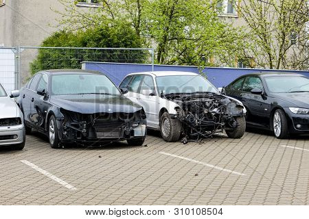 Senov, Czech Republic - April 12, 2019: A Row Of Damaged Modern Bmw Cars With Missing Frontal Panels