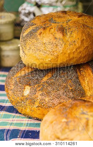 Pieces Loaf Of Bread With Poppy Seeds. Ogranic, Wheat Made Whole Grain Fresh Food.