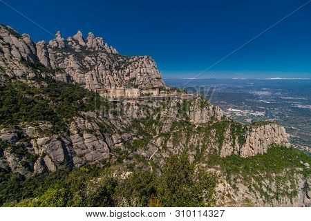 Aerial View On Santa Maria De Montserrat Abbey In Montserrat Mountains, Spain