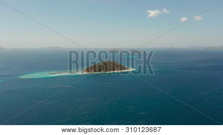 Aerial View Tropical Beach With White Sand And Clear Blue Sea. Tropical Landscape With Islands And B