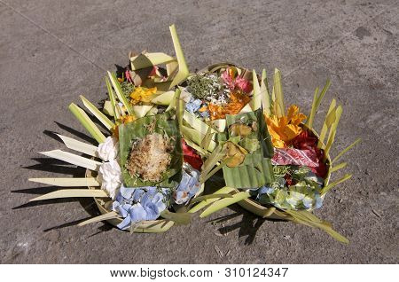 Close Up Picture Of Some Beautiful Decorated Canang Sari, The Religious Balinese Daily Offerings To 