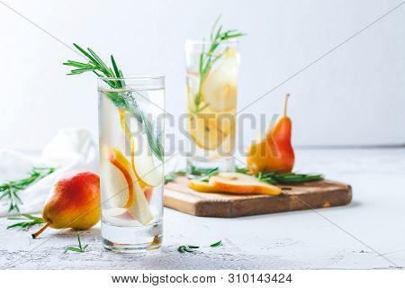 Summer Drinks, Rosemary Pear Cocktails With Ice In Glasses. Refreshing Summer Homemade Alcoholic Or 
