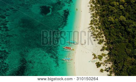 Tropical Beach With Palm Trees And Turquoise Waters Of The Coral Reef, Top View, Puka Shell Beach. B