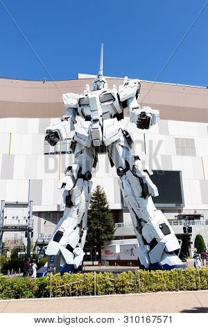 Tokyo, Japan - April 28, 2019, The Unidentified Traveler Look At Rx-0 Unicorn Gundam Statue In Norma