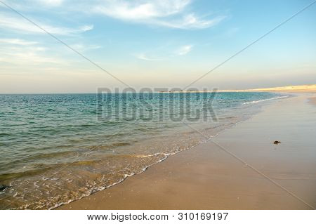 Shivrajpur Beach Near Dwarka Gujarat India At Dusk With Bue Arabian Sea