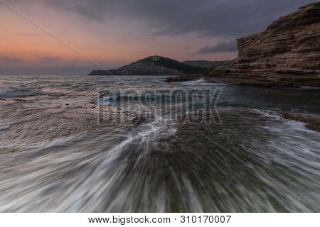 Waves Splashing In A Rocky Coast At Plentzia, Bizkaia, Spain