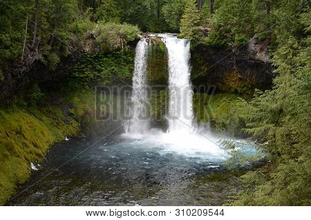 A Landscape Photo Of Koosah Falls On The Mckenzie River In Central Oregon