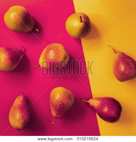 Yellow-pink Pears On A Colored Background. Vitamins, Organic Products, Autumn Harvest, Vegetarianism