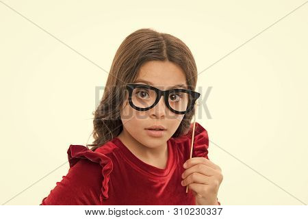 Kid Wear Cute Eyeglasses Photo Booth Props Accessory. Child Charming Isolated White Background. Girl