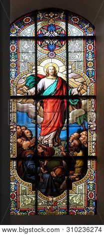 AALEN, GERMANY - JULY 12, 2018: Ascension of Christ, stained glass window in the Saint Nicholas Evangelical church, Aalen, Germany