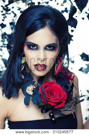 Pretty Brunette Woman With Rose Jewelry, Black And Red, Bright Make Up Kike A Vampire Closeup Red Li