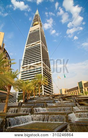 RIYADH - AUGUST 22: Sunset light at Al Faisaliah tower facade on August 22, 2016 in Riyadh, Saudi Arabia. Al Faisaliah towers is a luxury hotel and the most distinctive skyscraper in Saudi Arabia