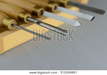 Used Wood Lathe Chisels On The Wooden Table