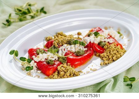 Grilled Red Pepper Marinated Salad Lunch Side View. Escalivada Cooked Vegetable Food On White Plate,