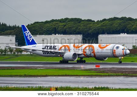 Passenger Airplane At Tokyo Narita Airport