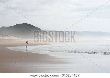 Beach Activity On An Overcast Summer Day, Mossel Bay, South Africa