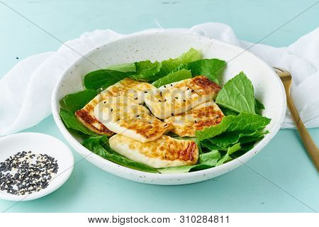 Keto Ketogenic Diet Grilled Haloumi With Lettuce, Mediterranean Cuisine On Pastel Background