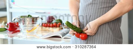 Cheerful Chef Showing Sexy Food Vegetable Erection. Man In Apron Joking At Culinary Blog. Comic Male
