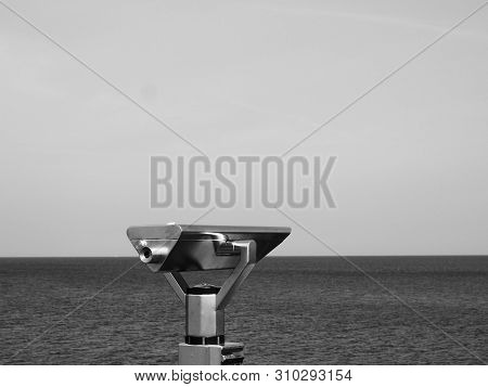 Binoculars On A Seabridge In Black And White