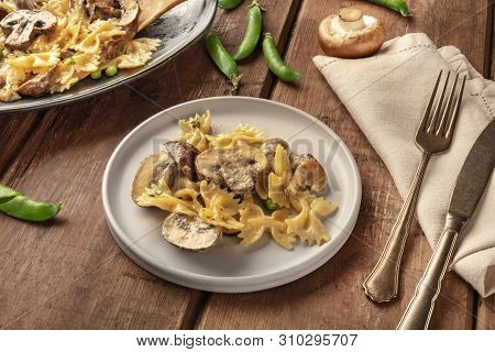 Mushroom And Cheese Pasta. Farfalle With Cremini And Green Peas, Easy Italian Vegetarian Recipe