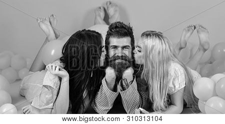 Man With Beard And Mustache Attracts Blonde And Brunette Girls. Girls Fall In Love With Macho, Kissi