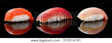 Classic Sushi On Black Background Set Of Nigiri Sushi With Reflection On Black Background Close-up