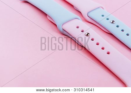Watchband. Silicone Strap For Sports Watches. Color Bracelet For Smart Watches On Pink Background