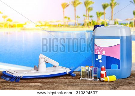 Equipment With Chemical Cleaning Products And Tools For The Maintenance Of The Swimming Pool.